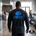 Oversized vintage black long sleeve t-shirt pump cover featuring a premium high-contrast back print of the melting blue badge and cracked Apocalypse Gym Wear skull design.
