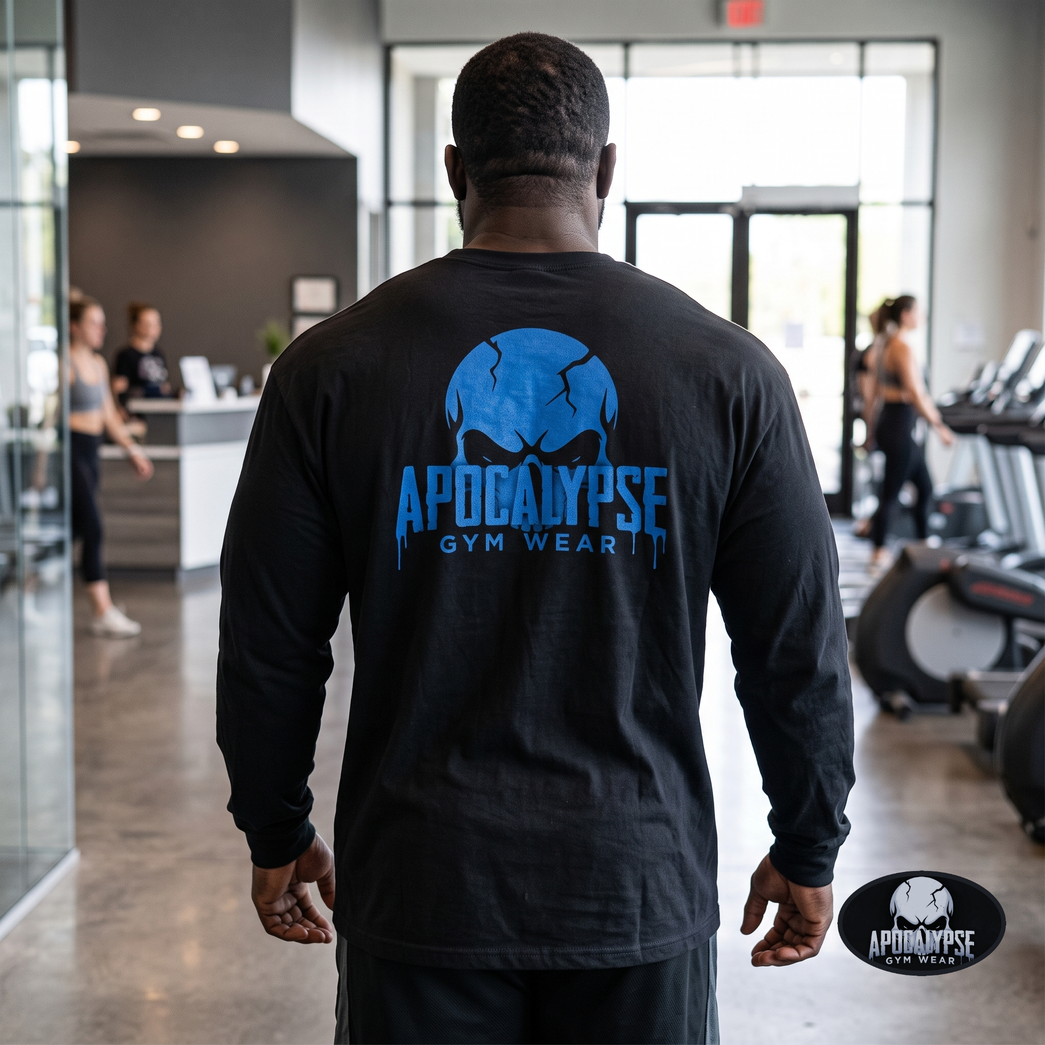 Oversized vintage black long sleeve t-shirt pump cover featuring a premium high-contrast back print of the melting blue badge and cracked Apocalypse Gym Wear skull design.