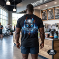 Apocalypse Gym Wear ,Premium vintage black boxy-fit heavyweight cotton gym t-shirt pump cover featuring a premium back print of a cracked stone doom skull engulfed in bright electric blue and deep orange plasma flames.