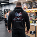 Apocalypse Gym Wear, Premium black relaxed-fit pullover gym hoodie pump cover featuring a massive back print of a gritty watercolor American flag skull graphic with aggressive dripping typography.