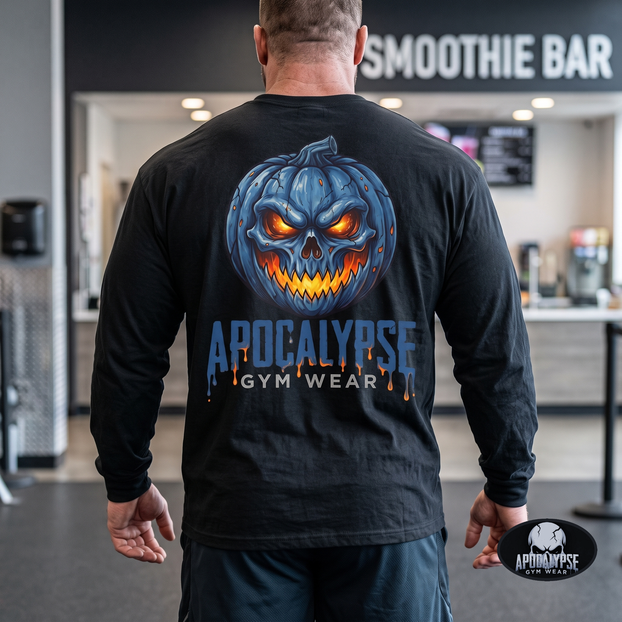 Apocalypse Gym Wear blue pumpkin skull long sleeve black shirt front view worn by a bodybuilder in a gym, featuring a small left chest jack-o'-lantern print.