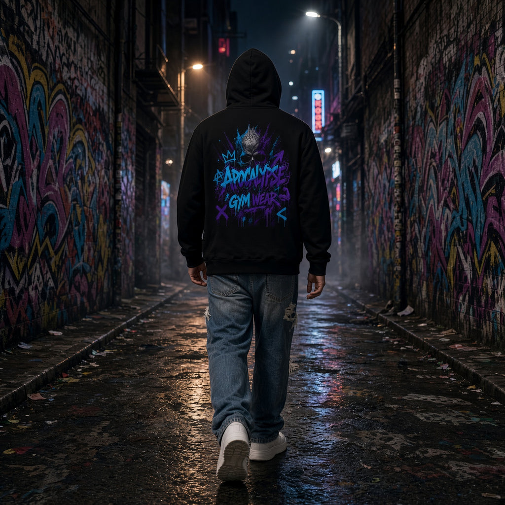 Apocalypse Gym Wear Color Riot Graffiti black heavyweight hoodie back view worn with hood up by male model in a dark alley.