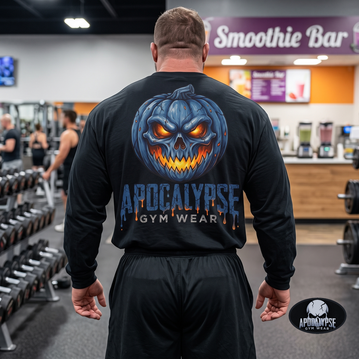 Apocalypse Gym Wear blue pumpkin skull long sleeve black shirt front view worn by a bodybuilder in a gym, featuring a small left chest jack-o'-lantern print.