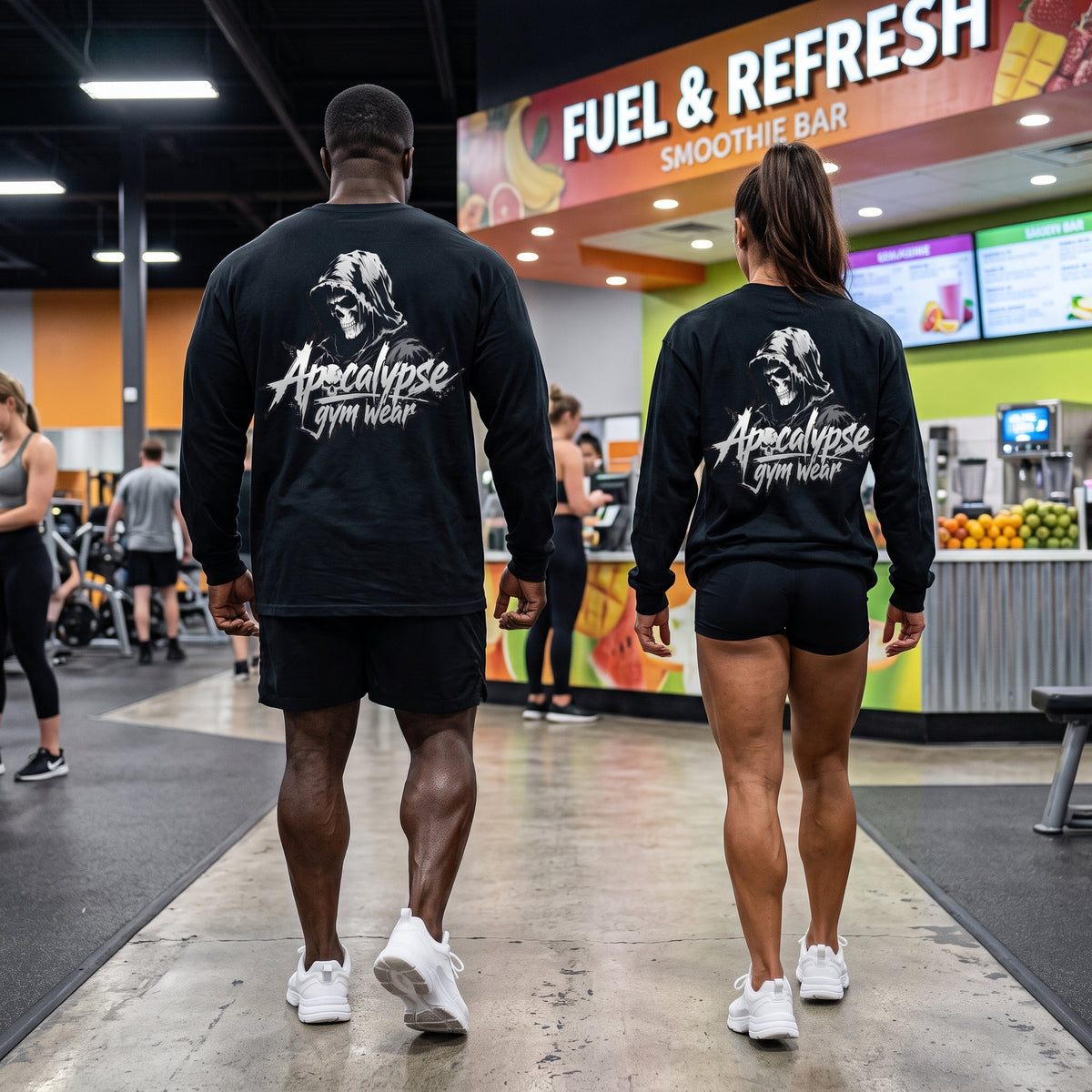 Apocalypse Gym Wear Monochrome Reaper black long sleeve t-shirt back product view worn inside a training facility, featuring a high-contrast hooded skull back print.