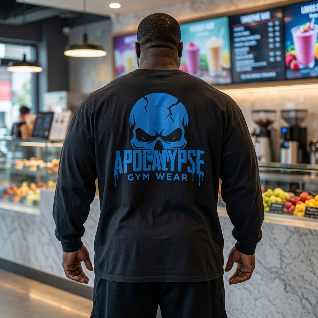 Oversized vintage black long sleeve t-shirt pump cover featuring a premium high-contrast back print of the melting blue badge and cracked Apocalypse Gym Wear skull design.